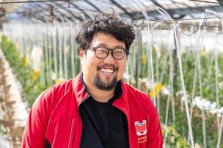 小串トマト生産者の一人、一瀬渉 氏。若手ながらも10年以上生産に携わっている