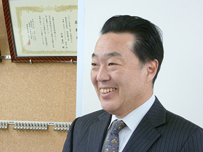 ファミリーマート<br>シニアオフィサー<br>多摩・甲信ディストリクト統括部長<br>前西 潤一 氏
