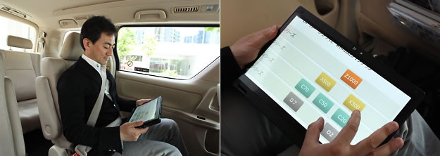 取材に向かう途中、タブレットスタイルで資料をチェック