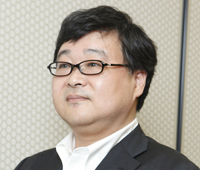 根本 勝氏（ねもと・まさる）<br>日経BP社パソコン局 プロデューサー