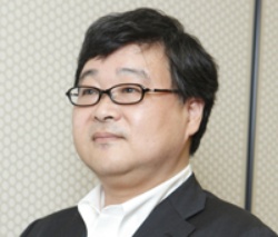根本 勝氏(ねもと・まさる)<br>日経BP社パソコン局 プロデューサー